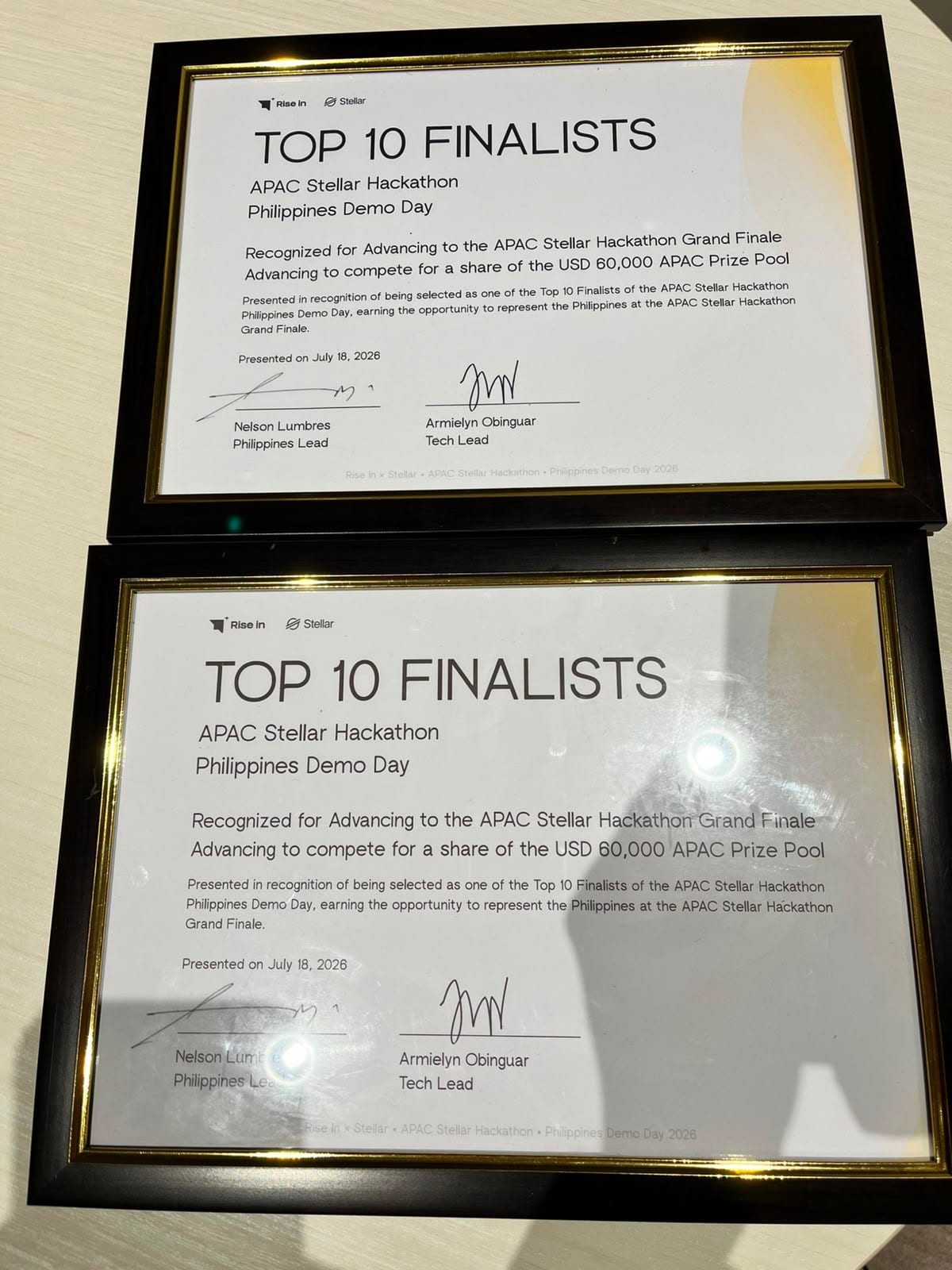 Two framed Top 10 Finalists certificates from the APAC Stellar Hackathon Philippines Demo Day